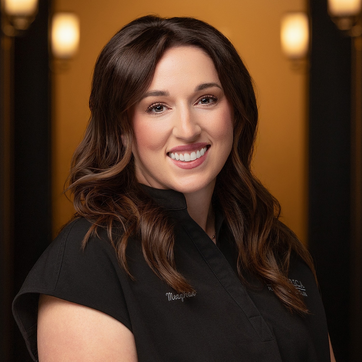 Smiling professional woman in black shirt